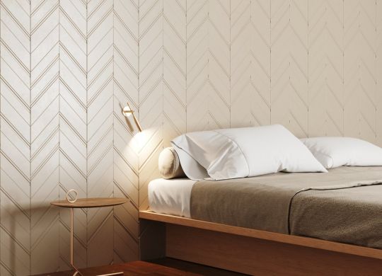 White Chevron coating applied to the decoration of a bedroom with a double bed.