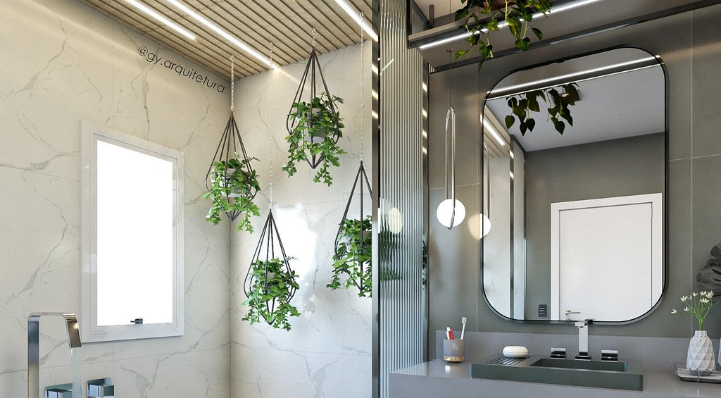 Decoração com espelhos em parede de banheiro.