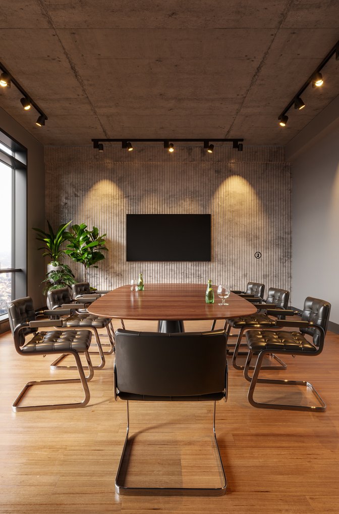 Estilo de decoração industrial aplicado em uma sala de reuniões em detalhes de madeira e cadeiras de couro.
