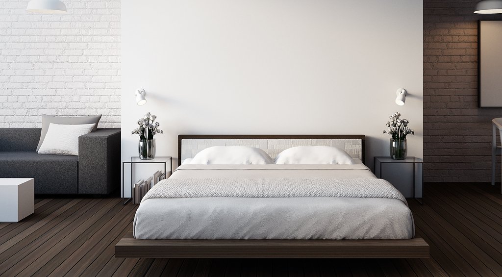 Estilo minimalista aplicado em quarto moderno em loft, seguindo a tendência de decoração para 2022.